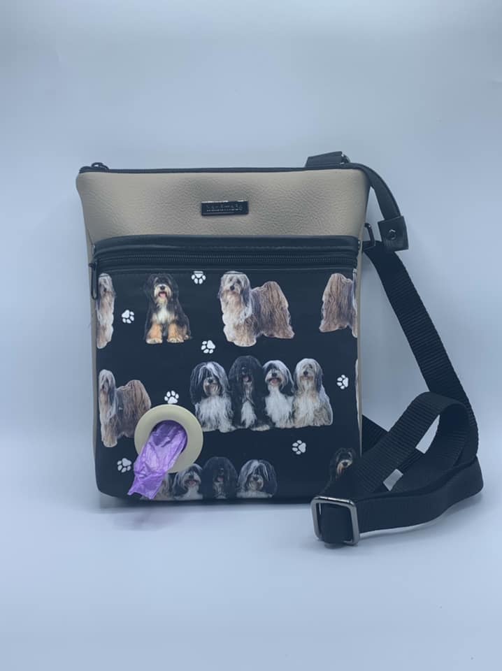 Crossbody bag with dog pattern on a white background